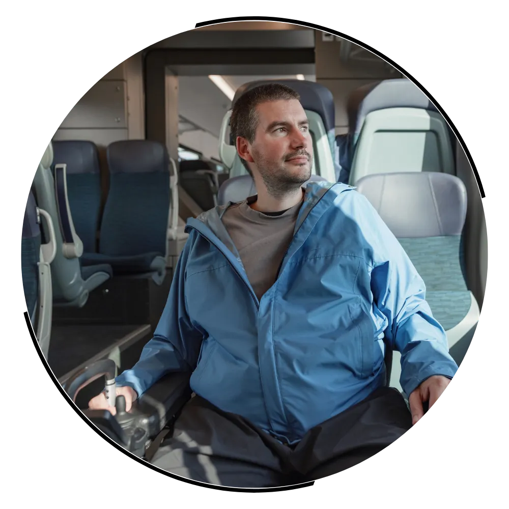 Disabled man sitting on train